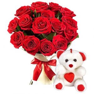 Pleasant Bouquet of 12 Red Rose and a Sweet Teddy