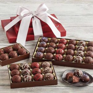 42 dark chocolate truffles, 3 boxes (0.6 oz per truffle): 24-truffle box [blueberry, chocolate decadence, cherry, extra dark ganache, raspberry, double espresso] 12-truffle box [cherry, raspberry, hazelnut, all dark] 6-truffle box [all dark] Net Weight: 1 lb 12 oz